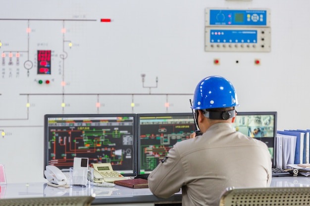 Engineer working on industrial circuit board
