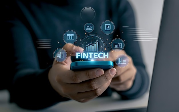 Fintech application being used on a laptop and phone